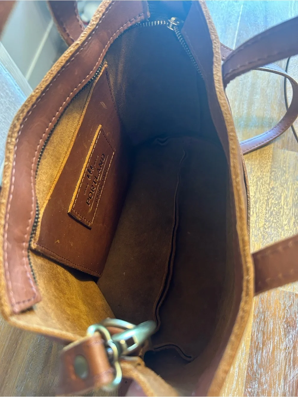 portland leather goods bought this
